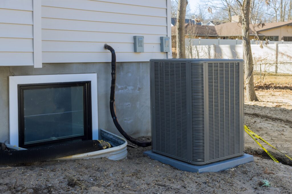 Air conditioning system outside installation on of the house the air conditioner in Tyrone