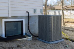 Air conditioning system outside installation on of the house the air conditioner in Tyrone
